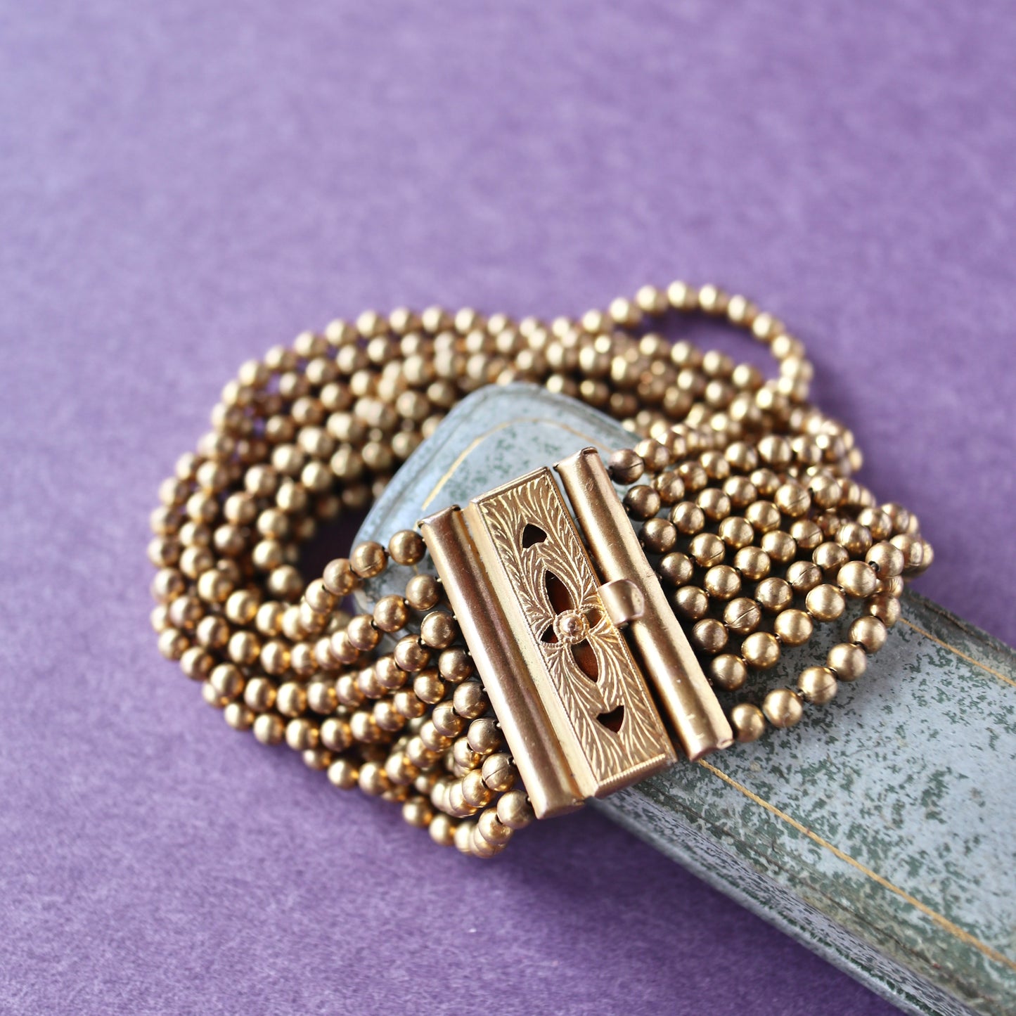 アールデコ ゴールドトーンメタル ブレスレット